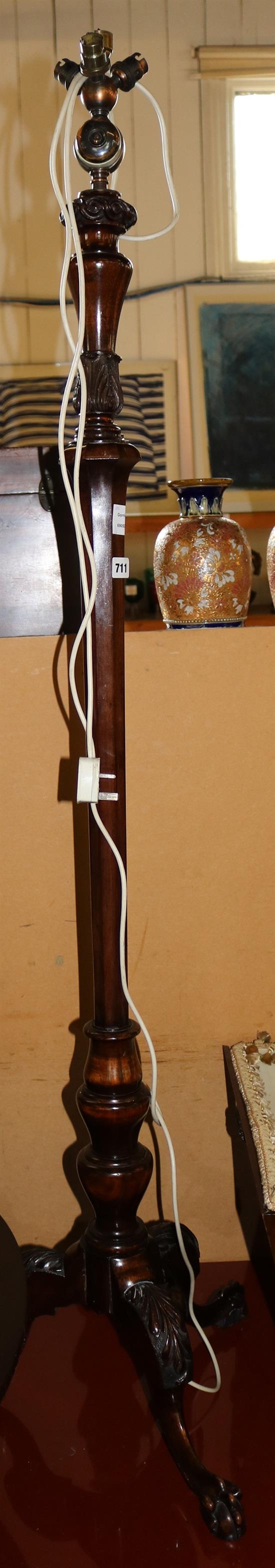 George III style mahogany lamp standard, with carved mahogany framed and gold pleated silk shade